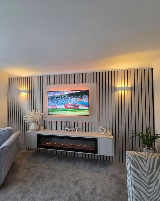 7. Modern Gray Entertainment Center with Full-Length Slatted Wall - living room entertainment center ideas