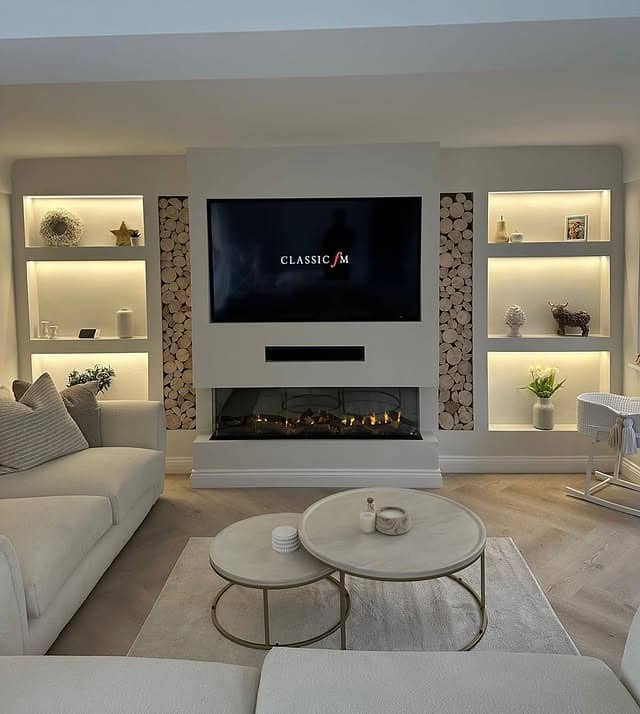 14. Modern White Entertainment Center with Decorative Log Accents - living room entertainment center ideas