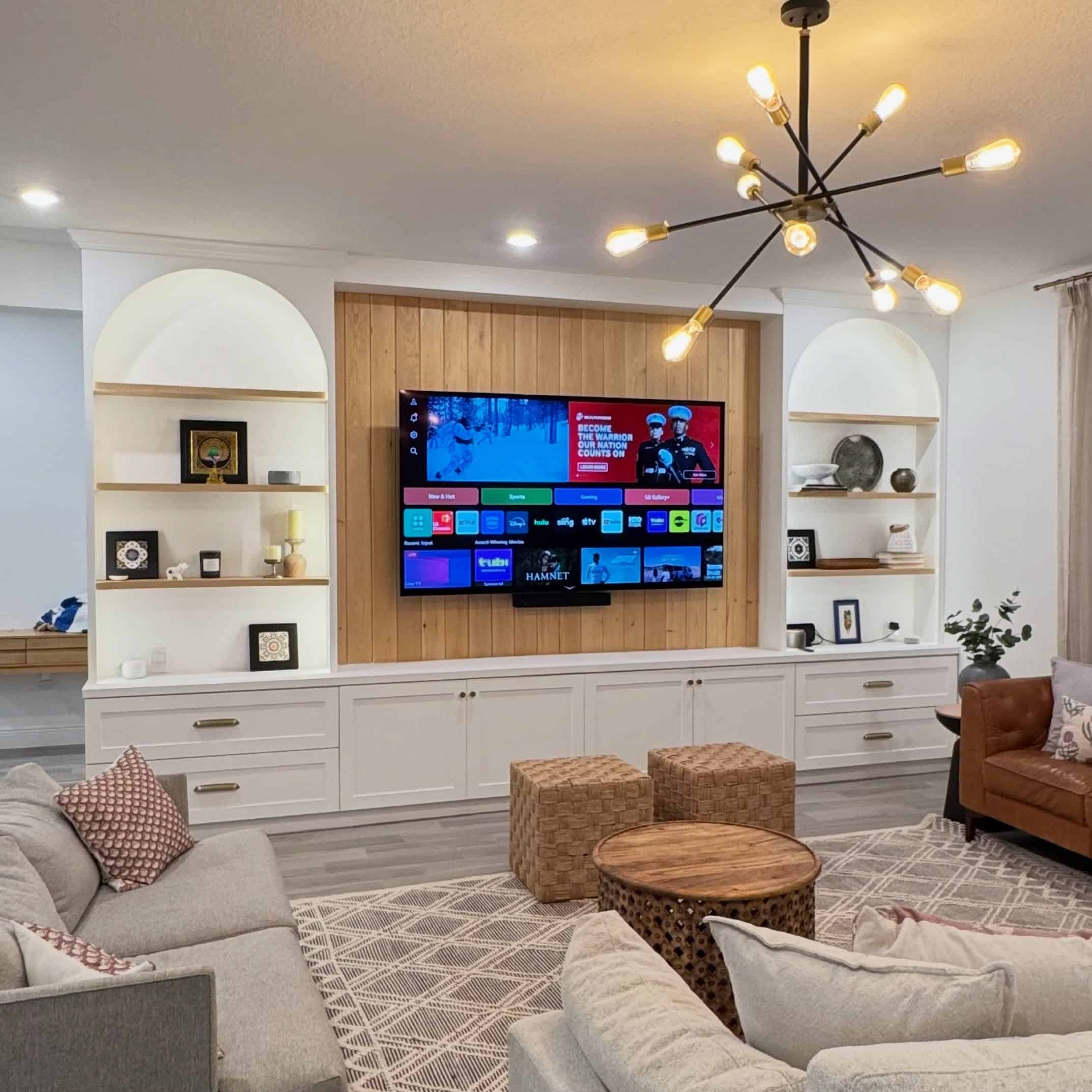 21. Modern Farmhouse White Entertainment Center with Natural Oak Paneling - living room entertainment center ideas