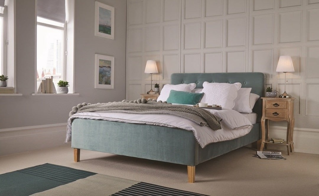 15. Minimalist Aqua and White Bedroom with Paneled Accent Wall - aqua bedroom ideas