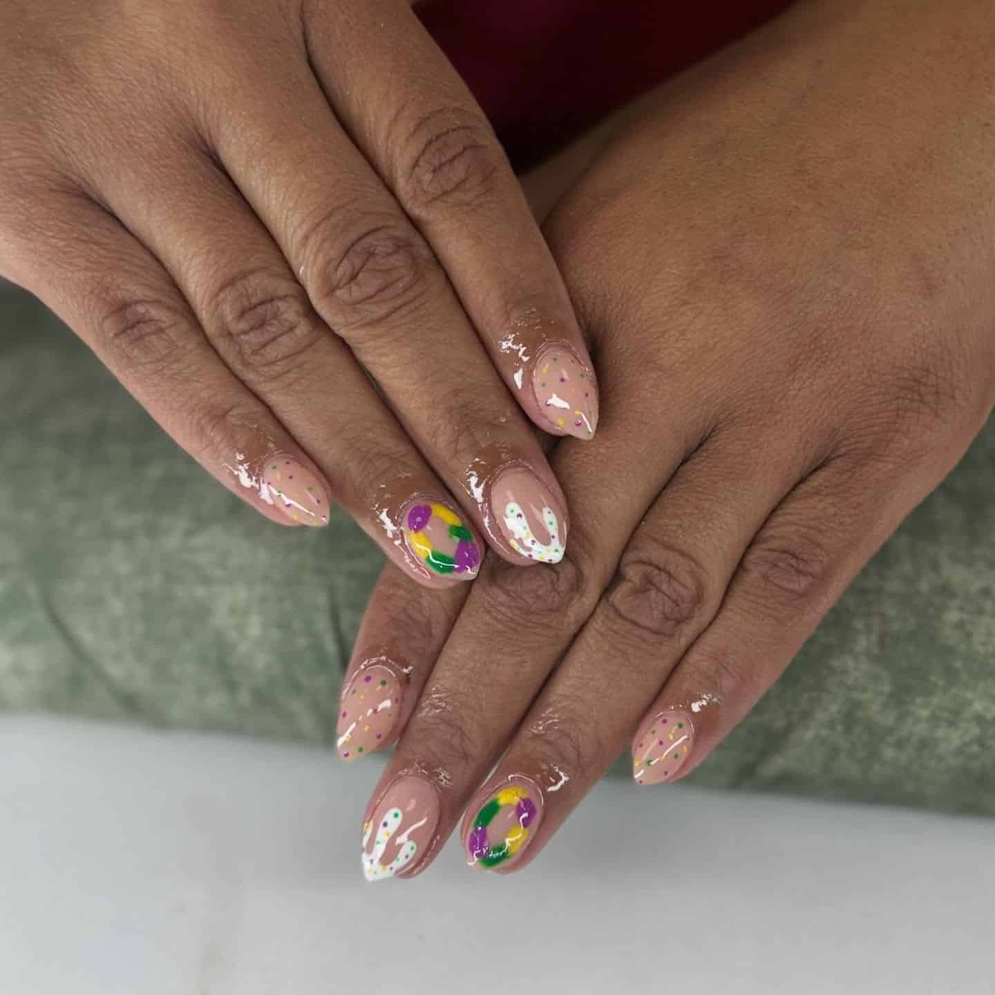 20. Purple, Green, and Gold Confetti Almond Mardi Gras Nails - mardi gras nail ideas