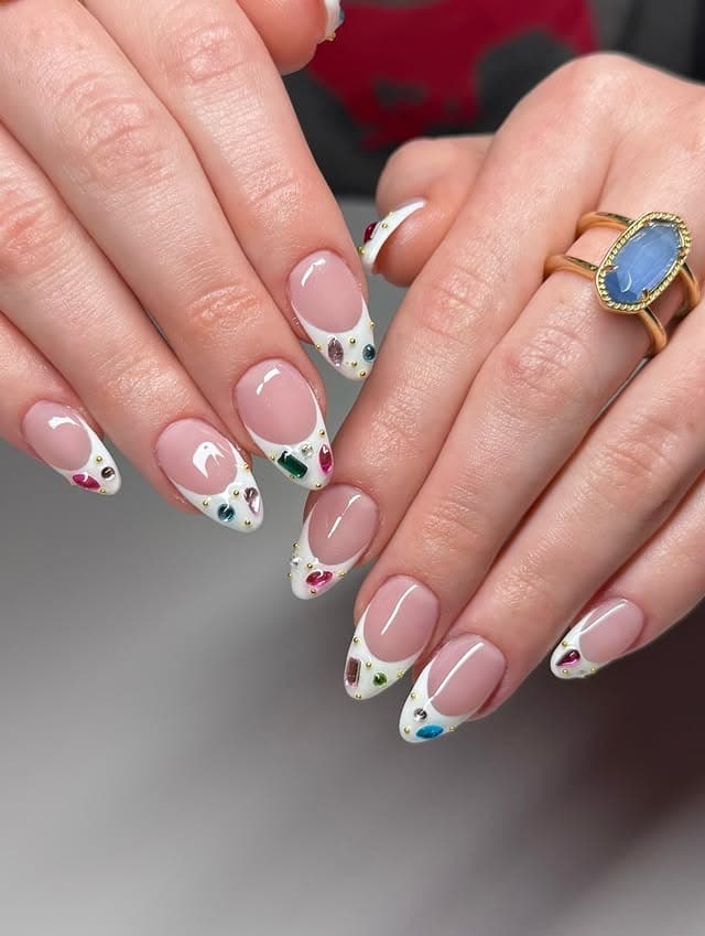7. White French Tip Nails with Multicolored Jewel Accents - nail ideas with gems