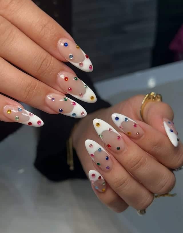 10. White French Stiletto Nails with Rainbow Rhinestones - nail ideas with gems