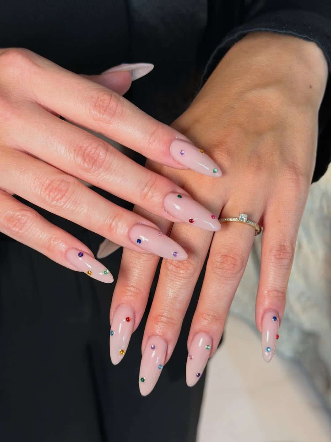 12. Milky Pink Almond Nails with Minimalist Rainbow Gems - nail ideas with gems