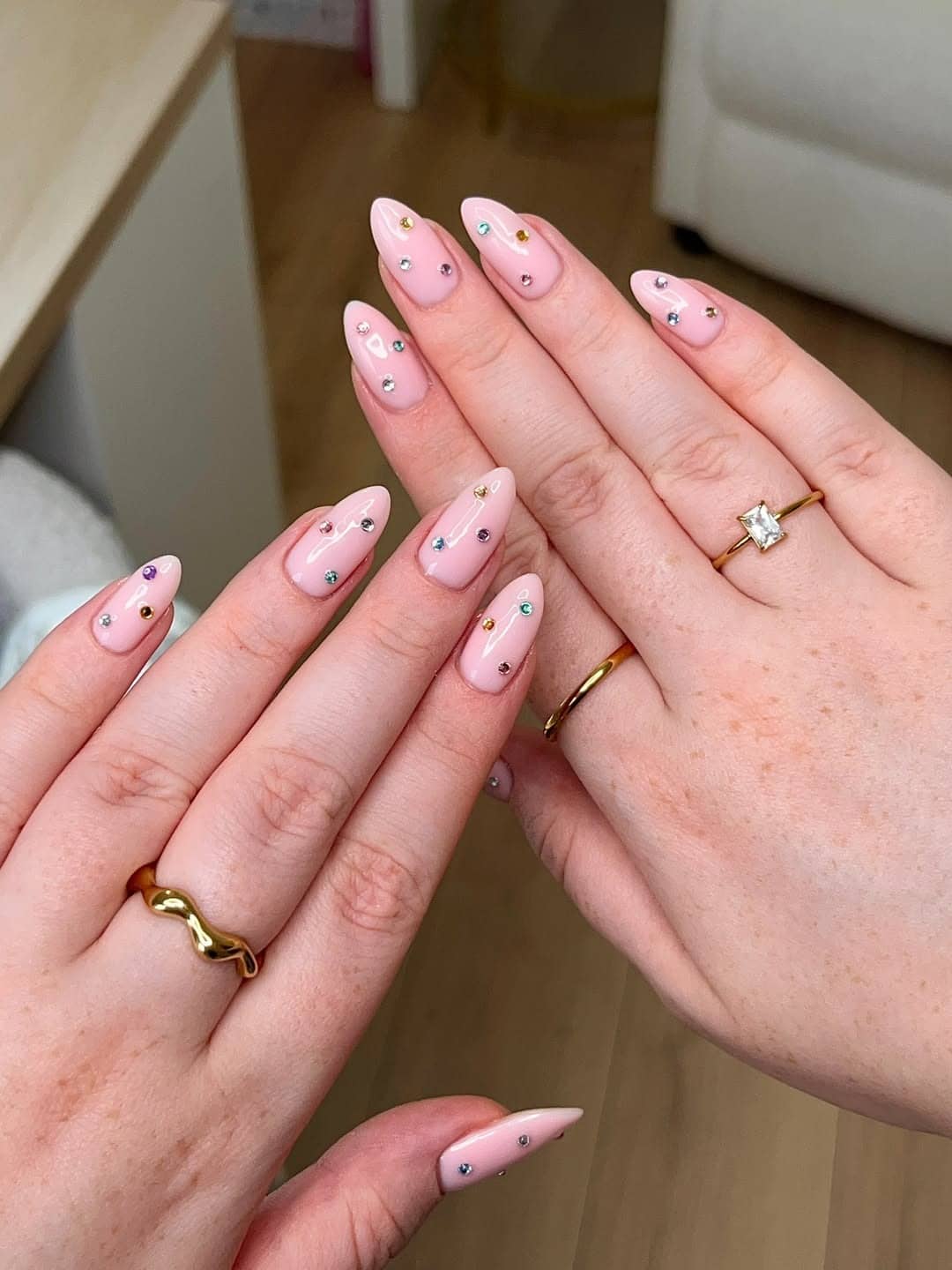 21. Baby Pink Almond Nails with Delicate Rainbow Gems - nail ideas with gems