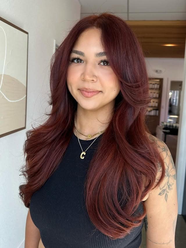 5. Dark Auburn Red Hair with Long Butterfly Layers - Red Hair Color