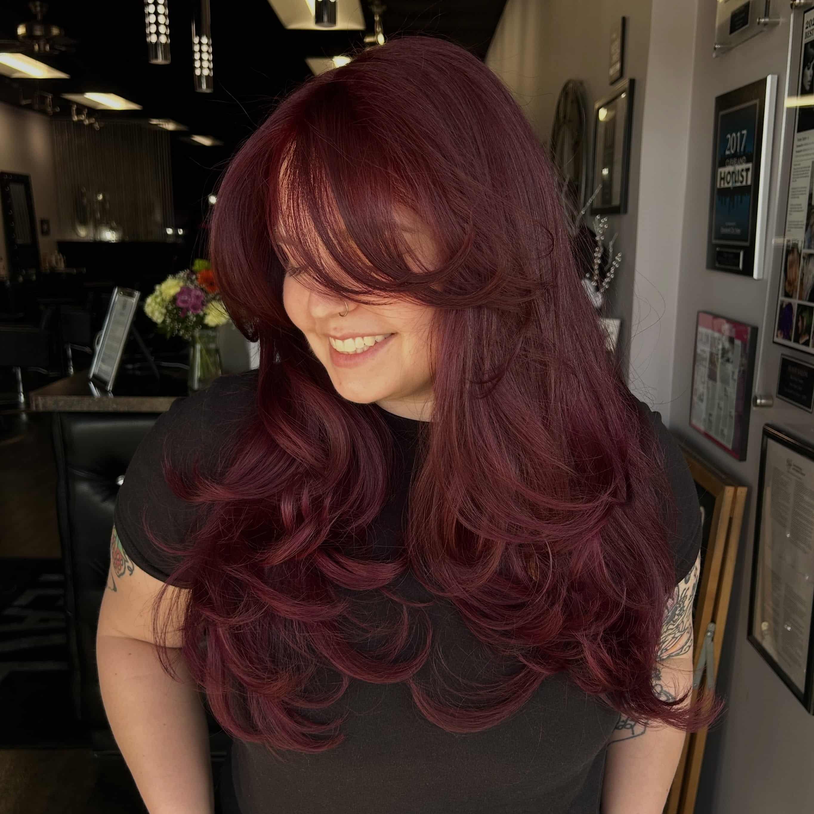 13. Dusty Burgundy Red Hair with Long Shaggy Butterfly Layers - Red Hair Color