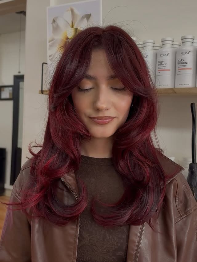 18. Dark Cherry Red Hair with Voluminous Butterfly Layers - Red Hair Color