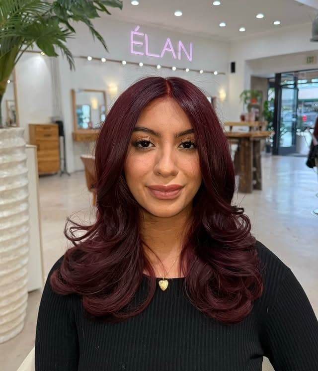 19. Rich Plum Burgundy Red Hair with Soft Layered Curls - Red Hair Color