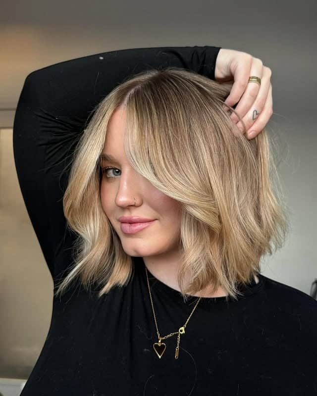 3. Sandy Blonde Textured Lob with Face-Framing Layers - Short Blonde Hairstyles