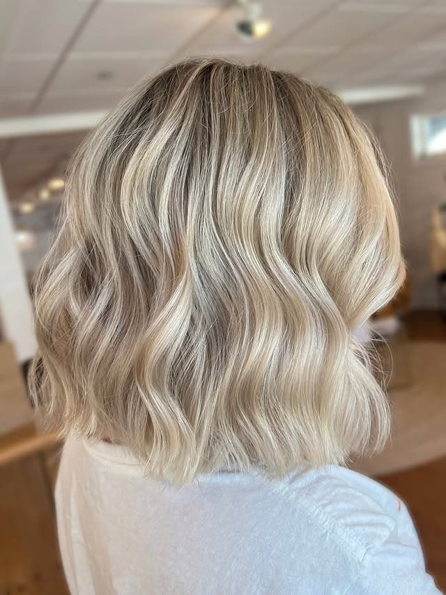 5. Champagne Ash Blonde Wavy Bob with Shadow Roots - Short Blonde Hairstyles