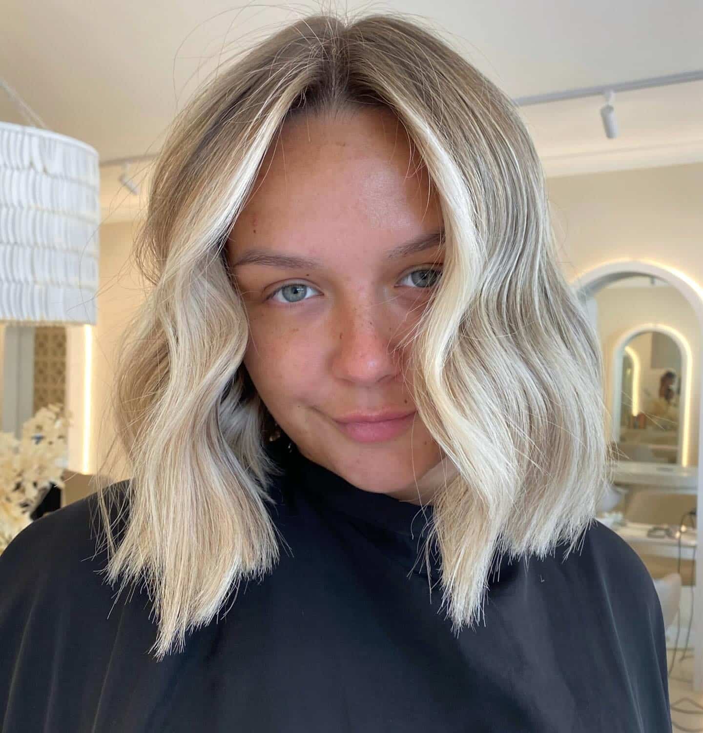 7. Icy Vanilla Blonde Tousled Lob with Money Pieces - Short Blonde Hairstyles