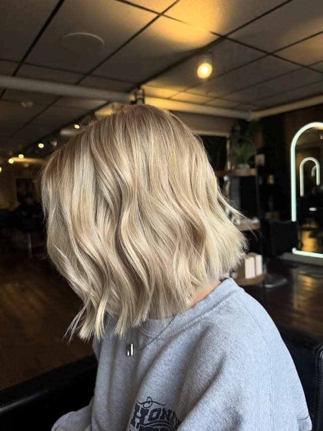 20. Creamy Butter Blonde Tousled Bob with Beach Waves - Short Blonde Hairstyles