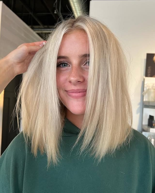 22. Icy Platinum Blonde Blunt Lob with Soft Face-Framing Layers - Short Blonde Hairstyles