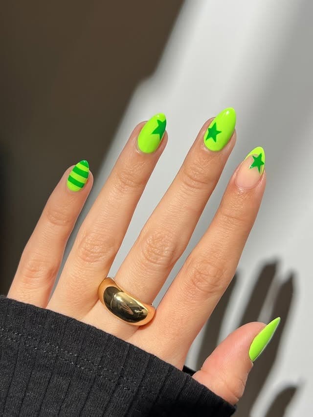 4. Neon Green Star and Stripe Almond Nails - neon green nail ideas