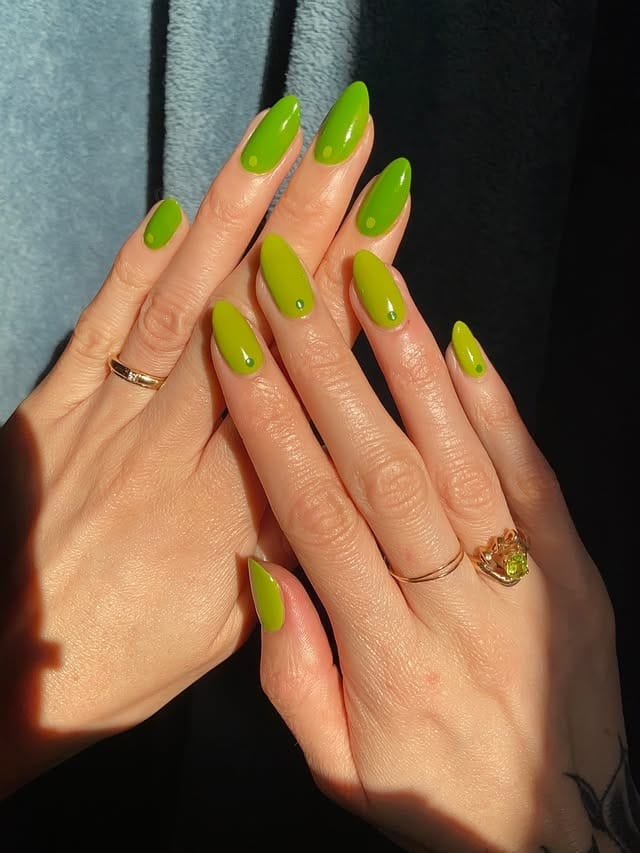 9. Chartreuse Green Almond Nails with Minimal Dot Accents - neon green nail ideas