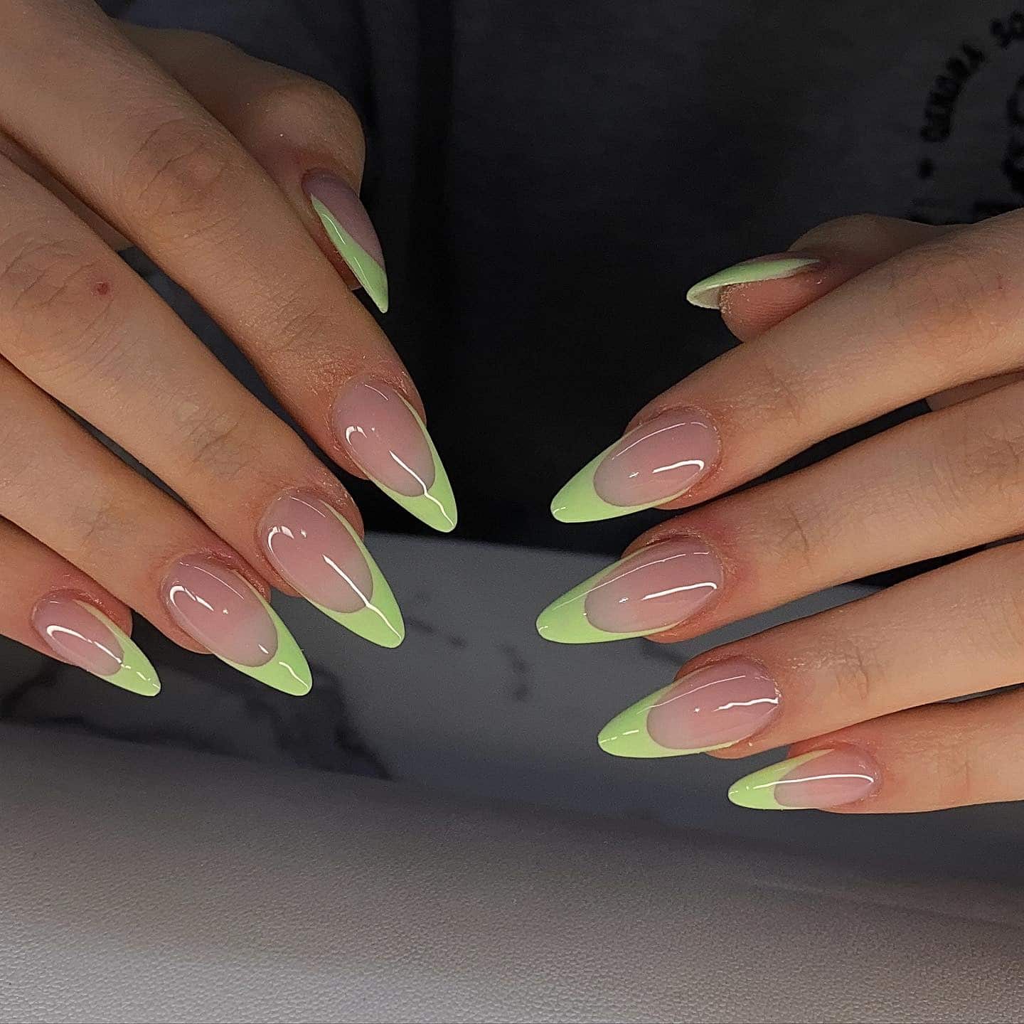 14. Pastel Neon Green French Tip Stiletto Nails - neon green nail ideas