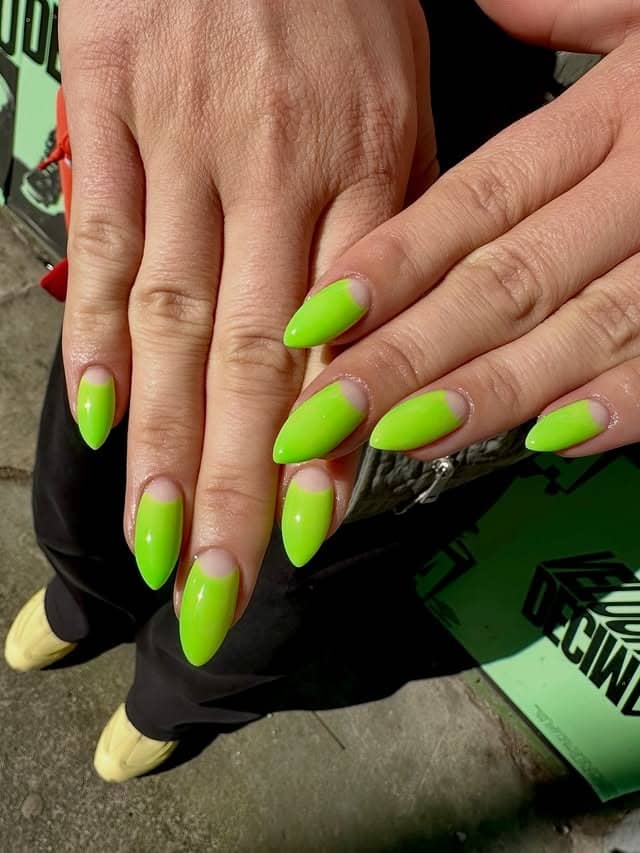 15. Neon Chartreuse Green Half-Moon Almond Nails - neon green nail ideas
