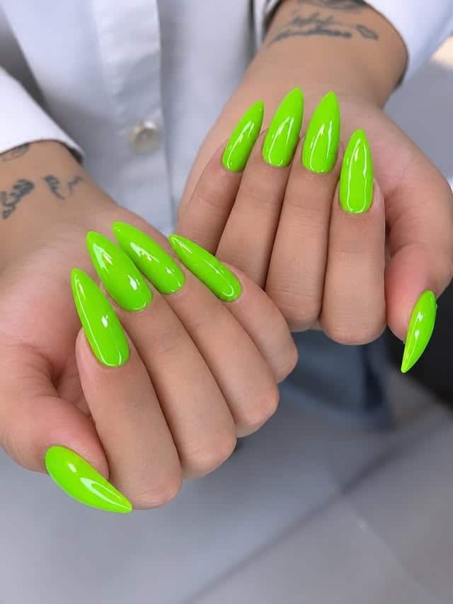 20. Electric Neon Lime Green Long Almond Nails - neon green nail ideas