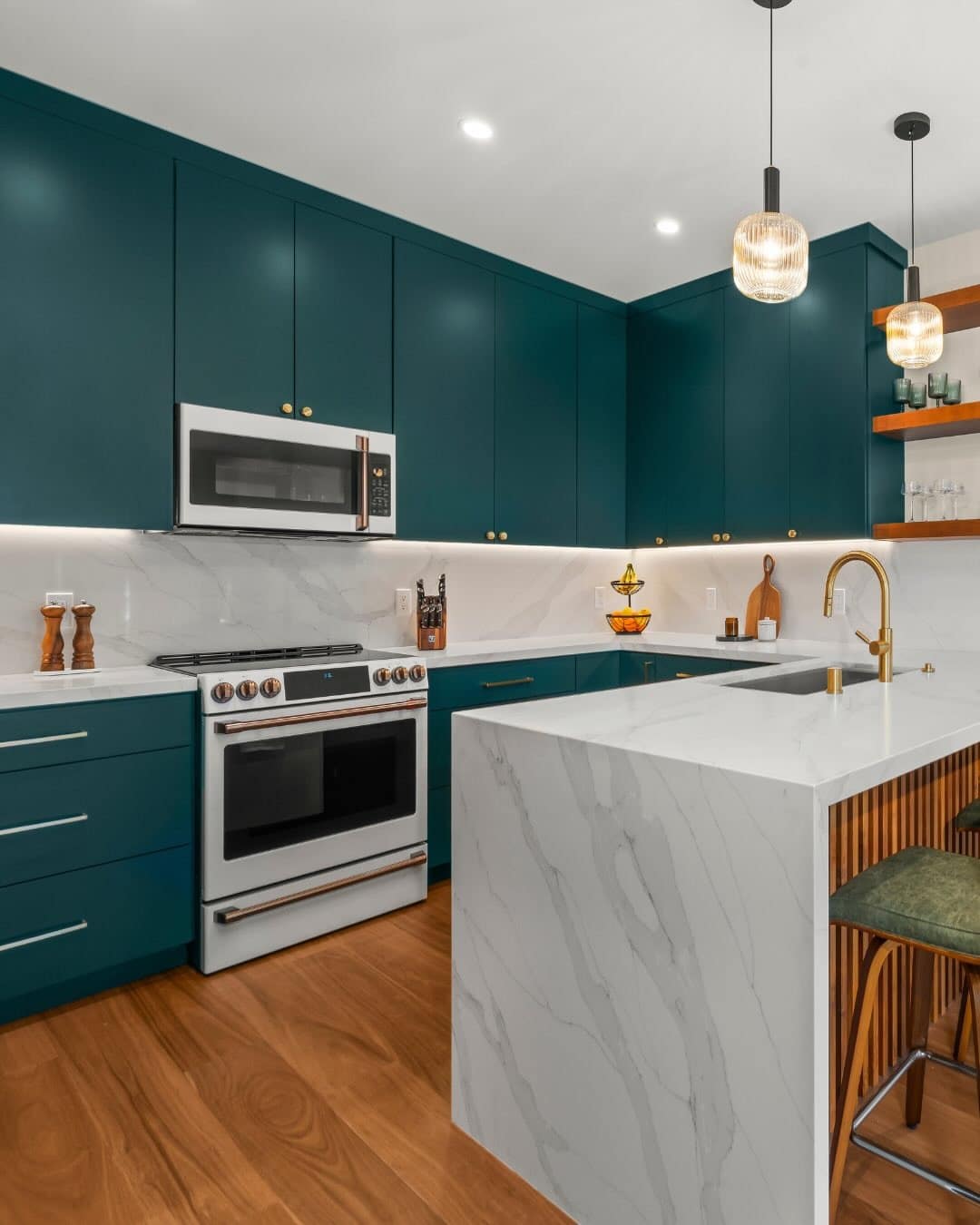 6. Modern Deep Emerald Green Kitchen with White Waterfall Island - emerald green kitchen ideas
